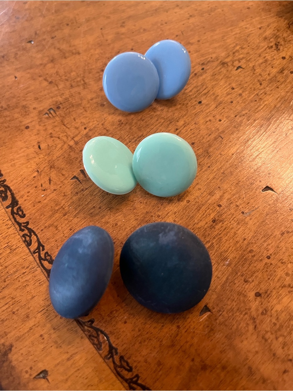 Three pairs of blue earrings